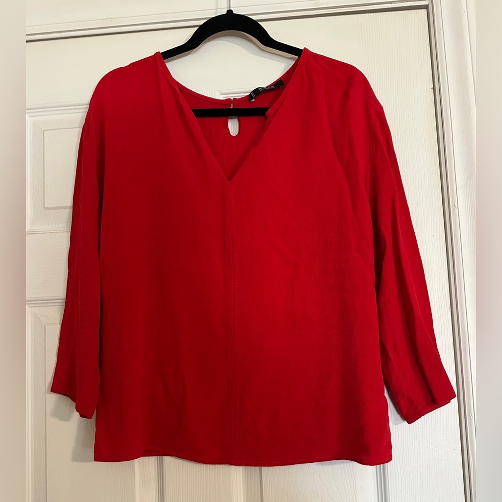MNG Basics V-Neck blouse keyhole button back closure.